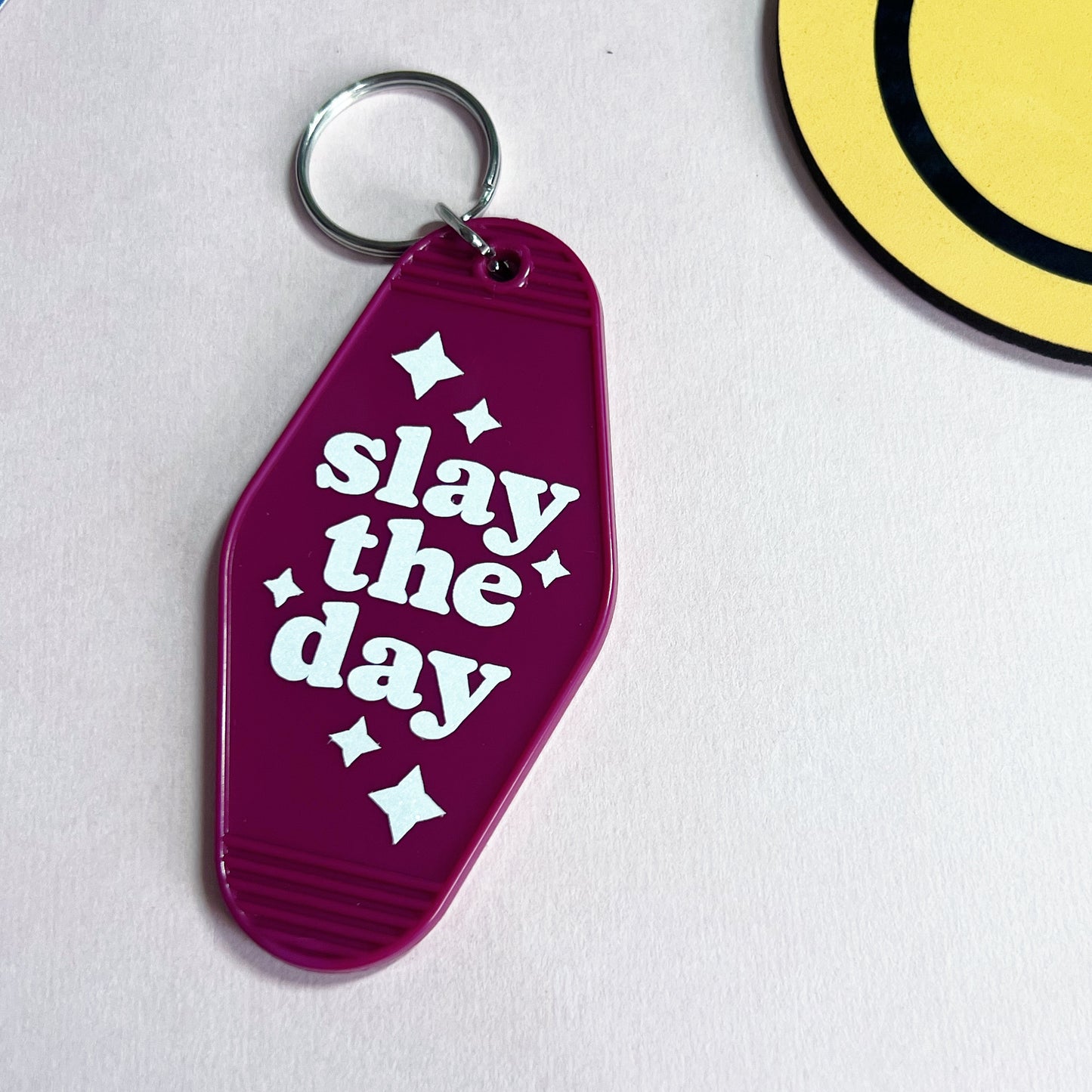 Slay The Day Motel Keychain