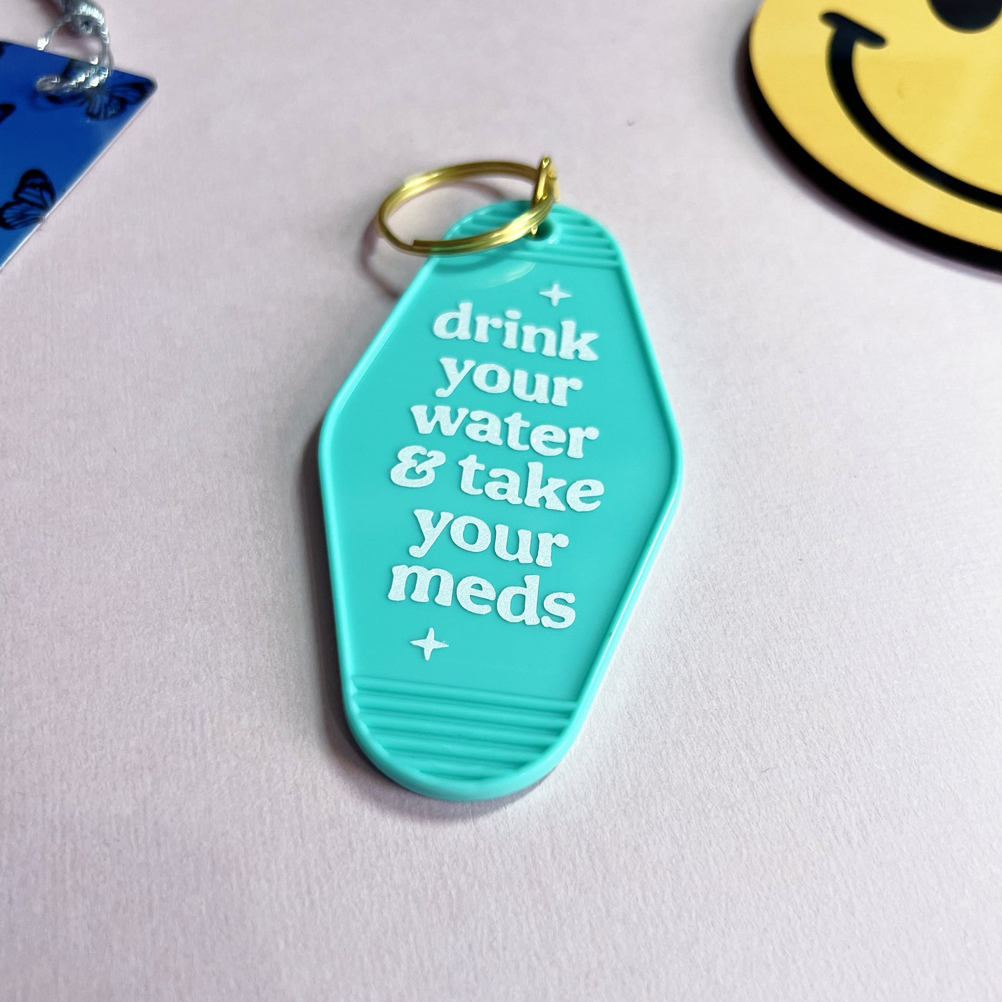 Drink Your Water & Take Your Meds Motel Keychain